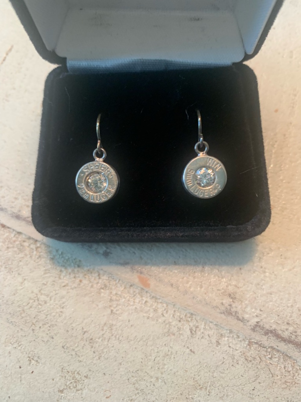 9mm Luger Bullet Earrings with beautiful clear stone.